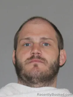 Mugshot of Eric D Hutcheson booked in Denton County, Texas on April 10, 2026