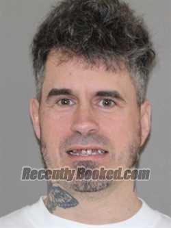 Booking photo from Denton County, Texas