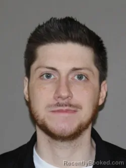 Mugshot of Austin J Hilliard booked in Denton County, Texas on April 10, 2026