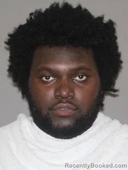 Mugshot of Malik S King-Chaney booked in Denton County, Texas on October 9, 2026