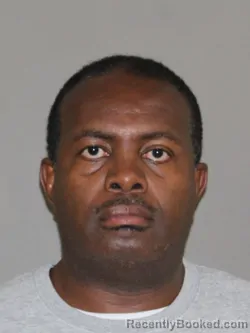 Mugshot of Patrick K Nganga booked in Denton County, Texas on August 19, 2026