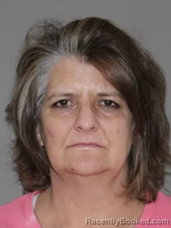 Mugshot of Monica E Dougherty booked in Denton County, Texas on March 12, 2026