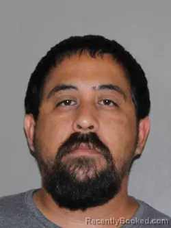 Mugshot of Israel Garza booked in Denton County, Texas on May 18, 2026
