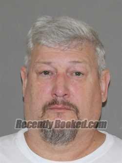 Booking photo from Denton County, Texas