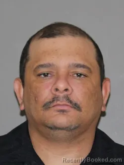 Mugshot of Juan A Navarro booked in Denton County, Texas on March 8, 2026