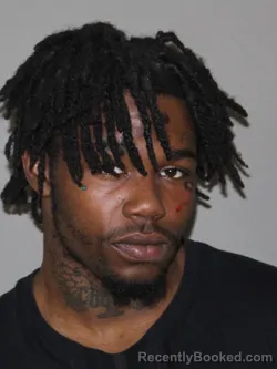 Mugshot of Quincy Redrick booked in Denton County, Texas on April 7, 2026