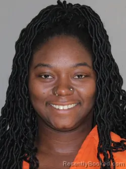 Mugshot of Tinia J Amie booked in Denton County, Texas on March 24, 2026