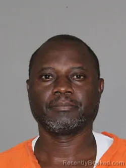 Mugshot of James K Onkangi booked in Denton County, Texas on August 11, 2026