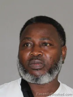 Mugshot of Adeniyi T Shittu booked in Denton County, Texas on May 26, 2026