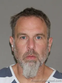 Booking photo from Denton County, Texas