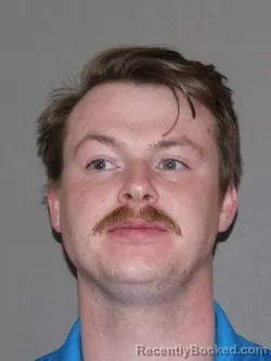 Booking photo from Denton County, Texas