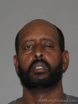 Mugshot of Nur A Muktar booked in Denton County, Texas on March 12, 2026