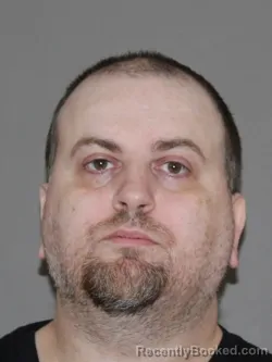 Mugshot of Adam B McQuilly booked in Denton County, Texas on March 16, 2026