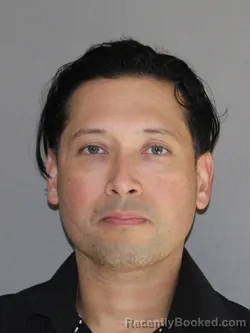 Mugshot of Juan A Colina Andrade booked in Denton County, Texas on March 20, 2026