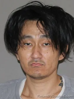 Mugshot of Denny Kim booked in Denton County, Texas on March 21, 2026