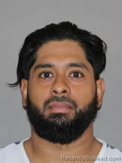 Mugshot of Juan L Duenas Aguirre booked in Denton County, Texas on March 22, 2026