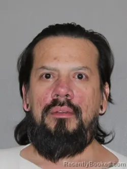 Mugshot of Justin Price booked in Denton County, Texas on April 8, 2026