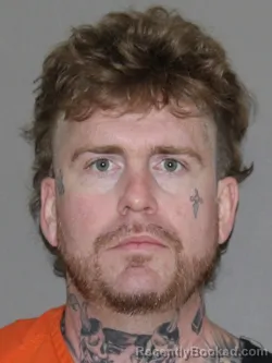 Mugshot of Adam L Johnson booked in Denton County, Texas on April 8, 2026