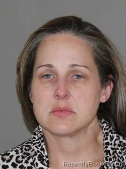 Mugshot of Julie M Eskander booked in Denton County, Texas on April 9, 2026