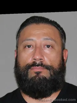 Mugshot of Adrian Delacruz booked in Denton County, Texas on September 30, 2026