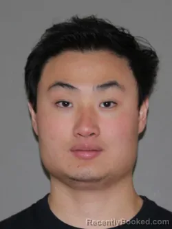 Mugshot of Kun Zhang booked in Denton County, Texas on August 12, 2026