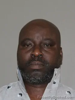Mugshot of Joseph N Kouao booked in Denton County, Texas on May 21, 2026