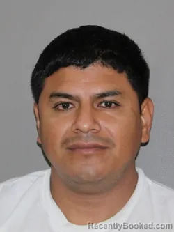 Mugshot of Adrian Martinez Secundino booked in Denton County, Texas on June 10, 2026