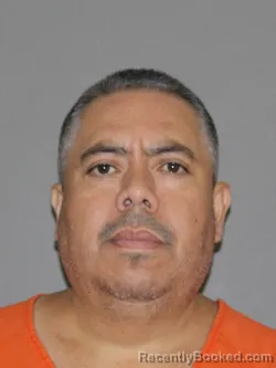 Mugshot of Juan Romero Millan booked in Denton County, Texas on July 15, 2026