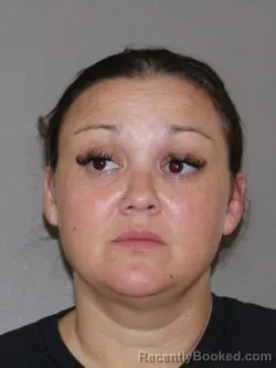 Mugshot of Michelle Bustillos booked in Denton County, Texas on August 9, 2026