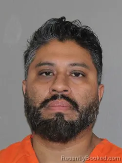 Mugshot of Emmanuel Alonso-Sandate booked in Denton County, Texas on August 23, 2026