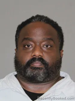 Mugshot of James M Waweru booked in Denton County, Texas on September 28, 2026