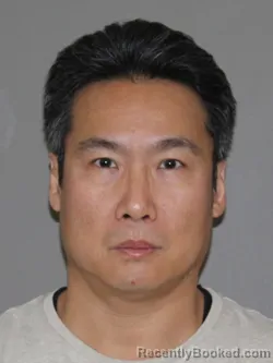 Mugshot of Andrew Choi booked in Denton County, Texas on October 1, 2026