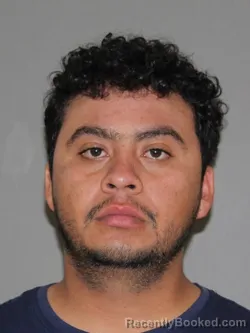 Mugshot of Hugo Arellano Rebollar booked in Denton County, Texas on October 11, 2026