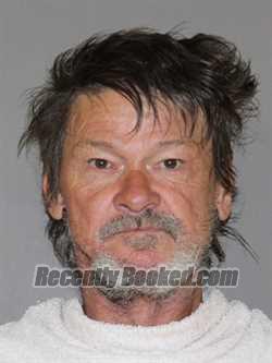 Booking photo from Denton County, Texas