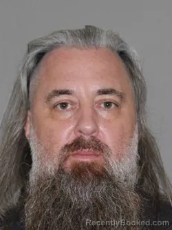 Mugshot of David C Wolfe booked in Denton County, Texas on October 14, 2026
