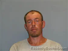Mugshot of Dustin Edward Schuenemann booked in DeWitt County, Texas on July 4, 2026