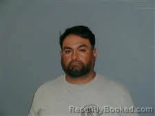 Mugshot of Adam Munoz booked in DeWitt County, Texas on July 31, 2026