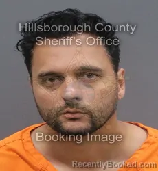Mugshot of DOUGLAS DENNER CARDOSO booked in Hillsborough County, Florida on May 16, 2026