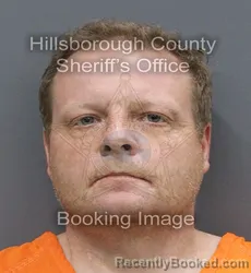 Mugshot of JOHN MANSFIELD ERVIN booked in Hillsborough County, Florida on August 4, 2026