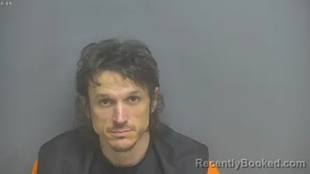 Mugshot of JOHN HERBERT THOMPSON