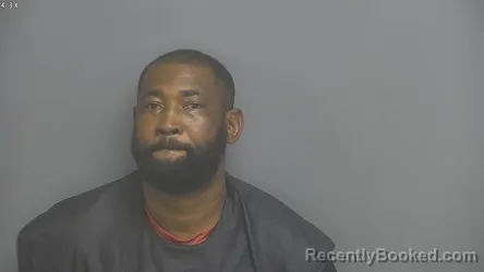 Mugshot of Kerlo Augustin booked in Amherst County, Virginia on August 10, 2026