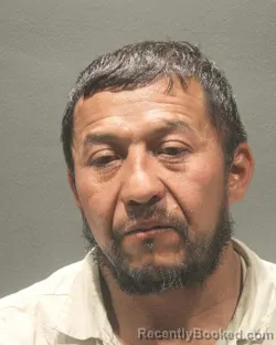 Mugshot of EVER SANTOS GUEVARA booked in Arlington County, Virginia on April 1, 2026