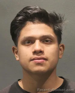 Mugshot of EVIL ISAAC GUZMAN PEREZ booked in Arlington County, Virginia on April 1, 2026