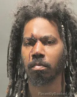 Mugshot of REGINALD SAEEDE BROWN booked in Arlington County, Virginia on April 5, 2026