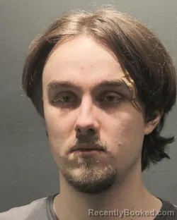 Mugshot of ANDREW BRANDON NOVOKSHANOV booked in Arlington County, Virginia on April 19, 2026
