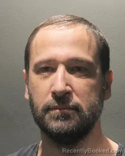 Mugshot of NATHAN SIMPSON booked in Arlington County, Virginia on April 20, 2026