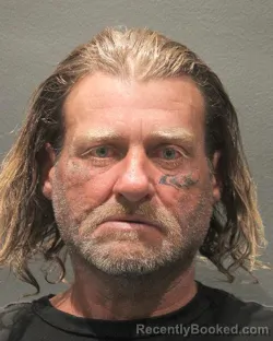 Mugshot of TIMOTHY DEAN HARMAN booked in Arlington County, Virginia on April 21, 2026