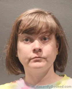 Mugshot of SHELBY DAVIS SCOTT booked in Arlington County, Virginia on April 21, 2026