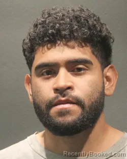 Mugshot of OSCAR ERNESTO MONJARAS booked in Arlington County, Virginia on April 22, 2026
