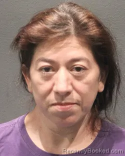 Mugshot of MARILU A CIFUENTES LOPEZ booked in Arlington County, Virginia on April 23, 2026